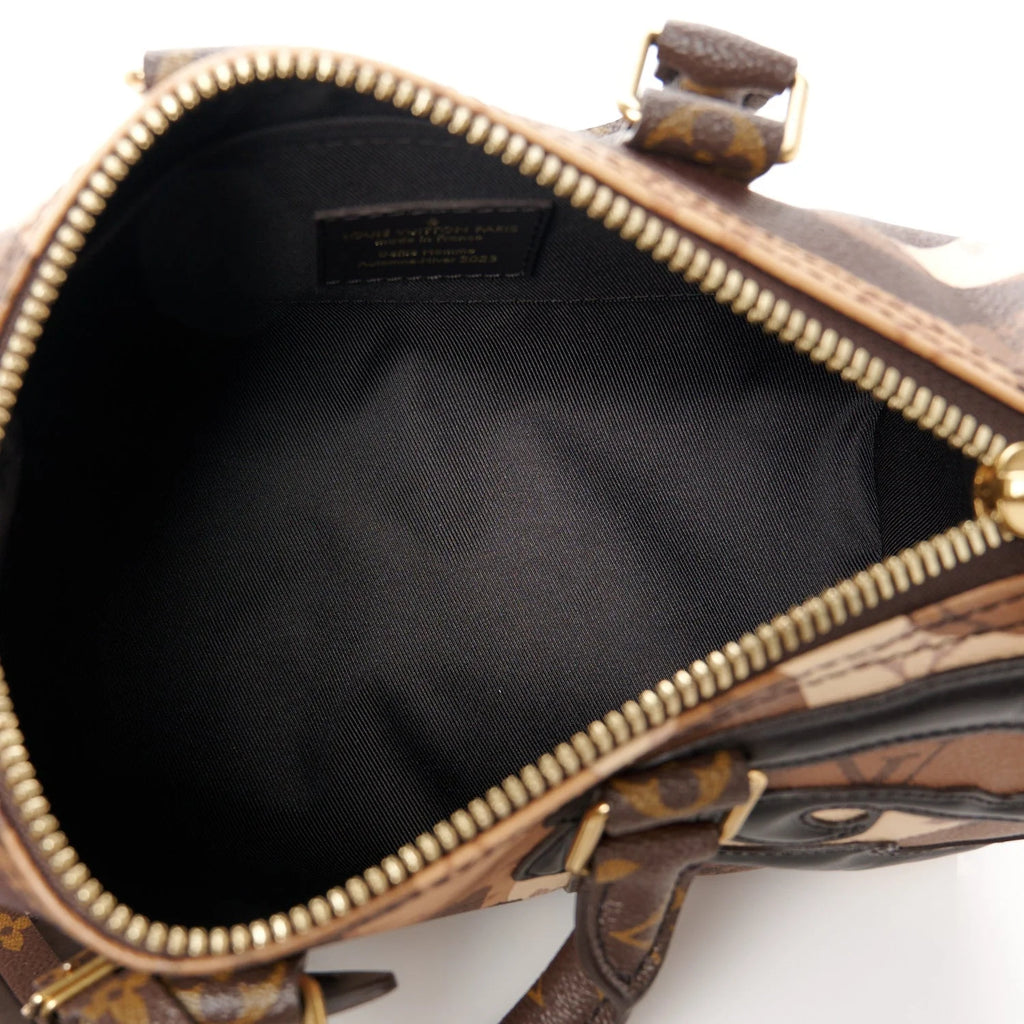 Louis Vuitton Monogram Portrait Keepall Bandouliere 25