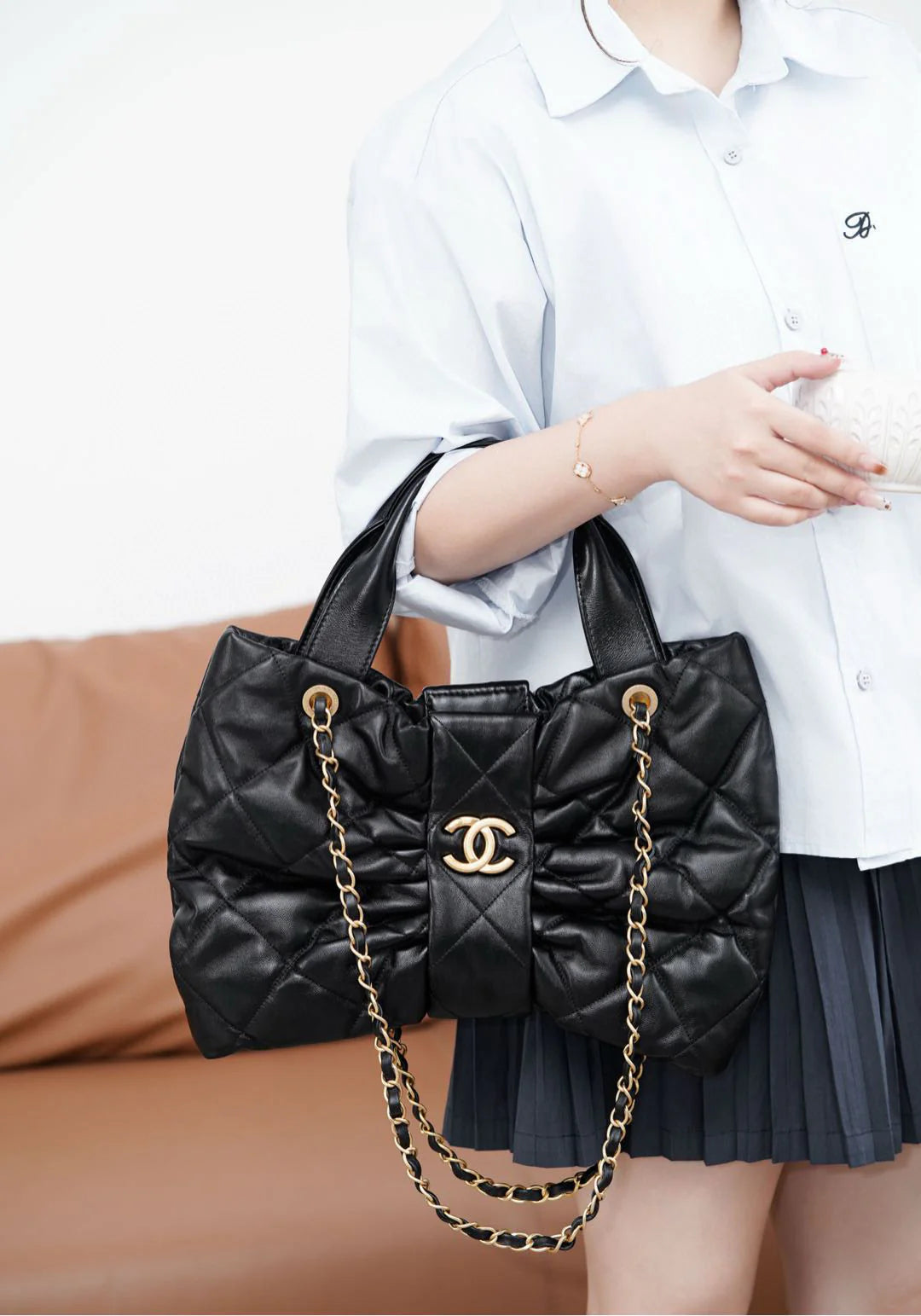 Chanel - Quilted Bow Top Handle Bag with Chain Strap