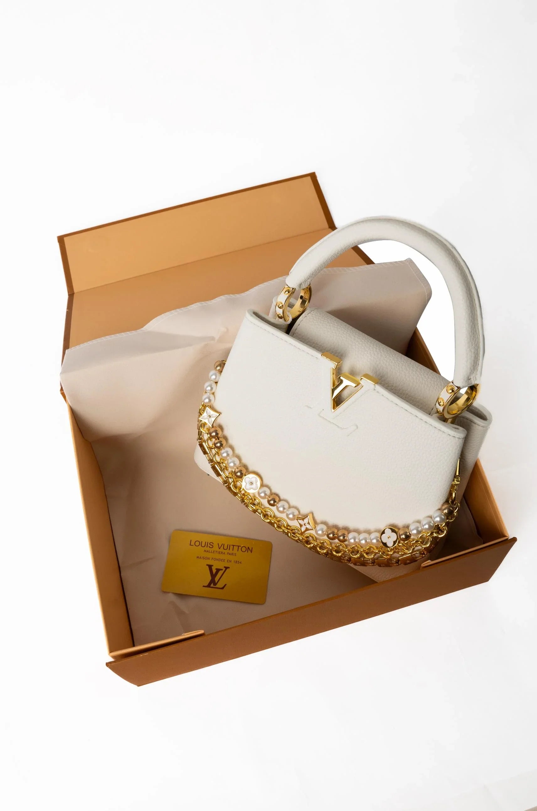 Louis Vuitton- White