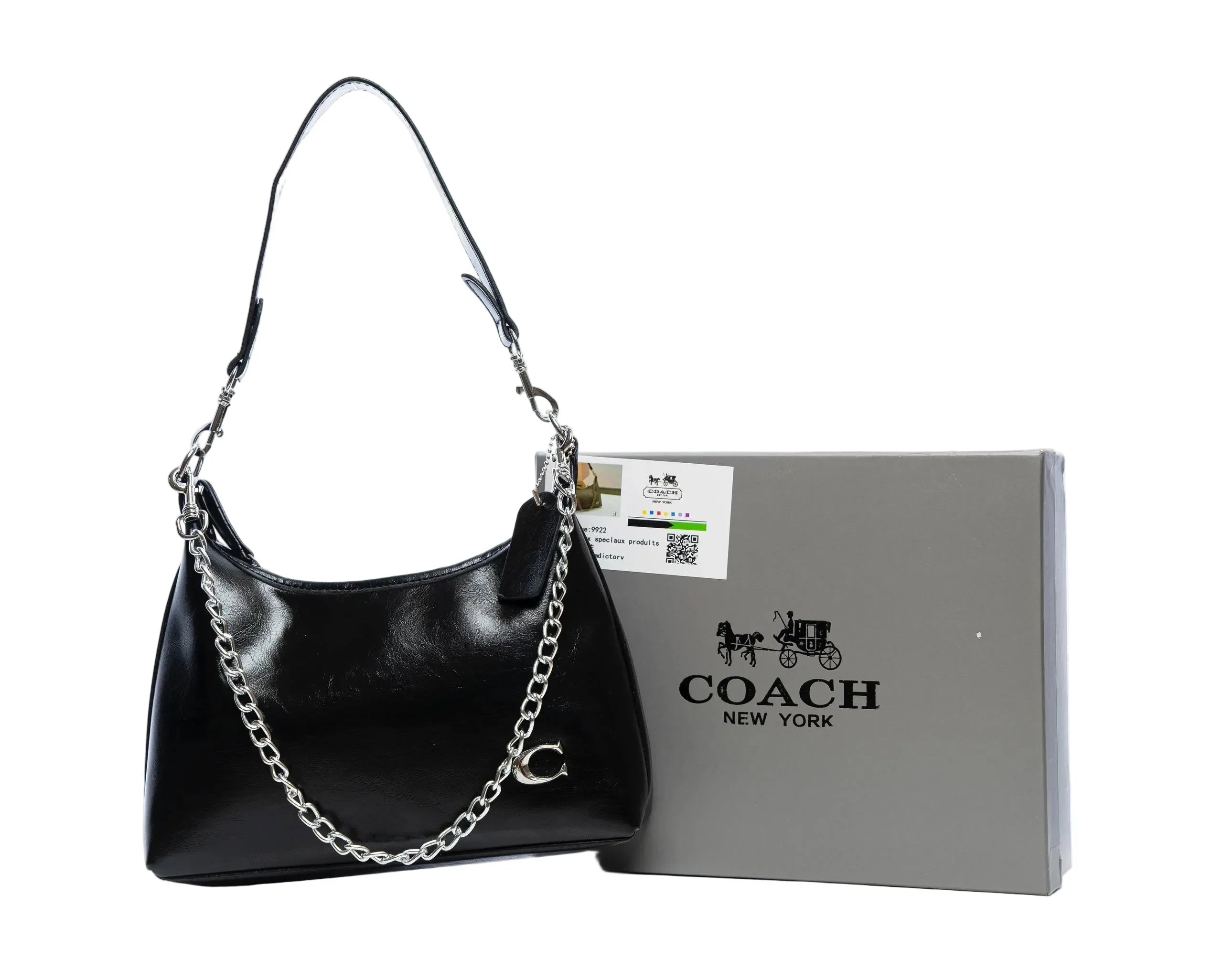 Black leather shoulder bag with silver chain strap and Coach New York box